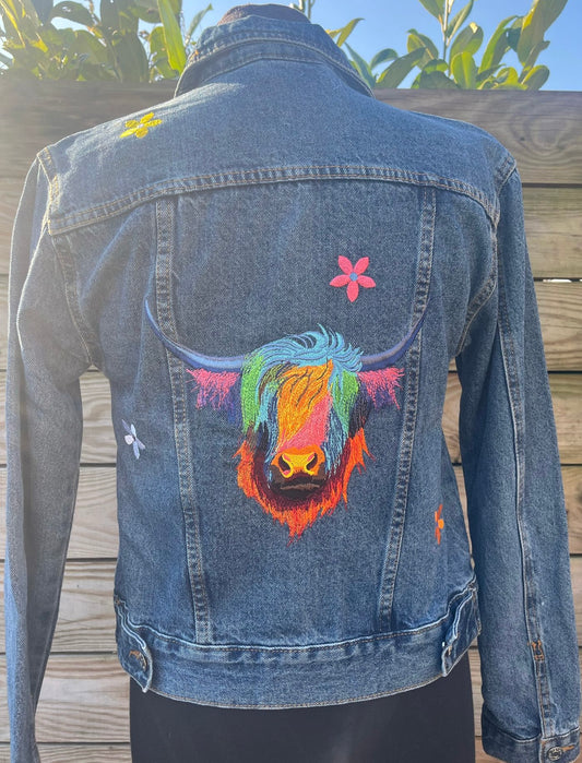 Ladies Denim Jacket with an embroidered Highland Cow and Scattered Flowers