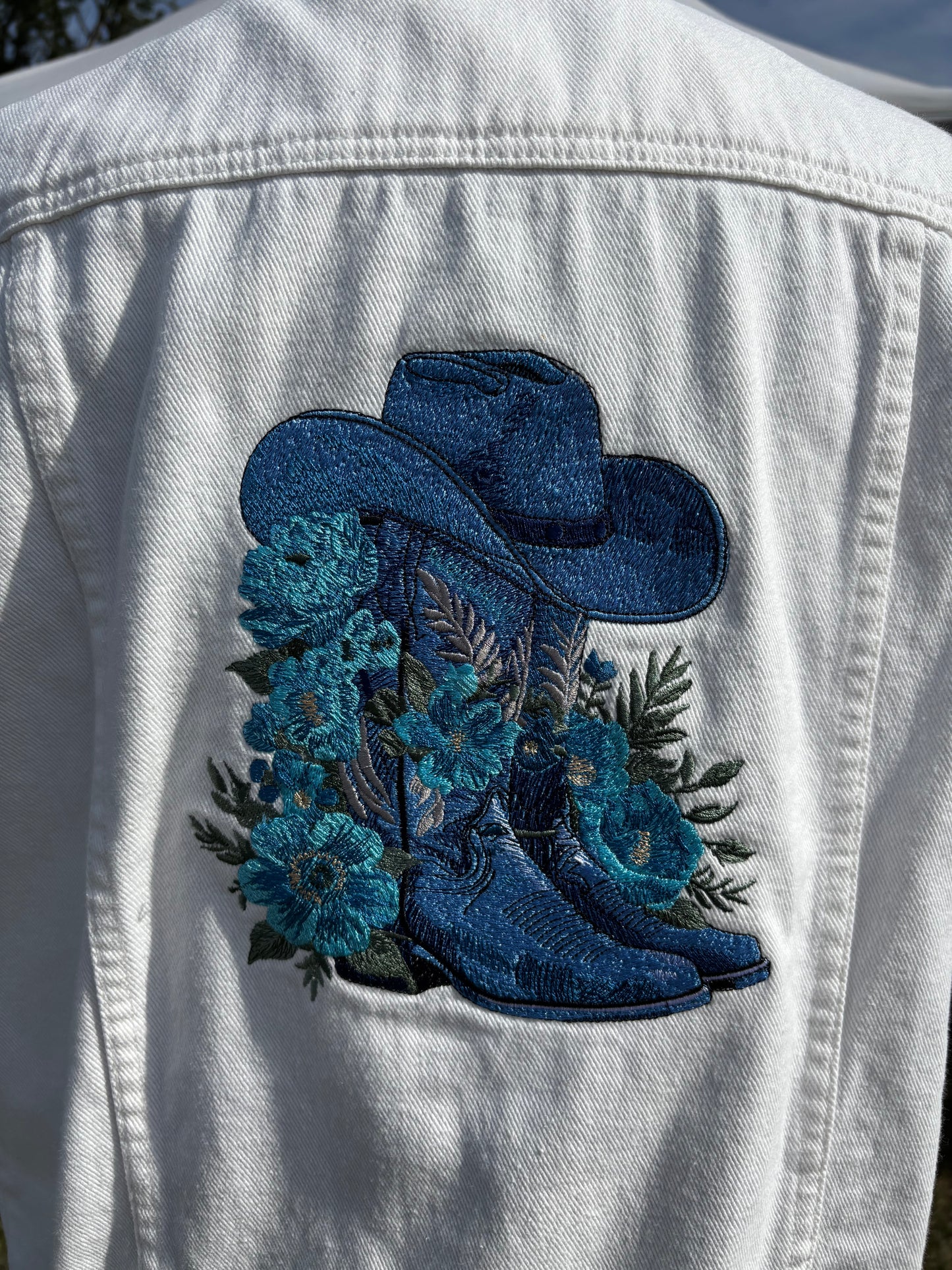 Blue Cowboy Boots on White Waistcoat